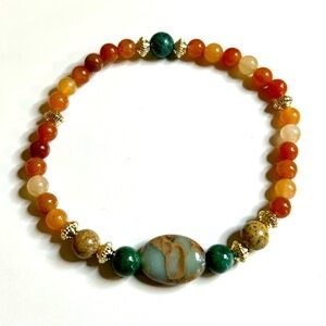 Life of a Showgirl - Gorgeous Green and Orange Stretch Bracelet